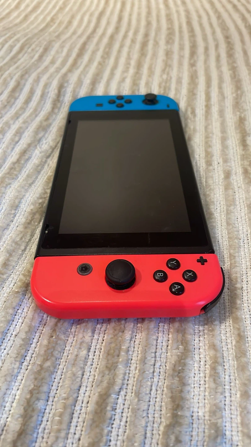 Nintendo Switch Console with Red and Blue Joy-Cons - photo 2