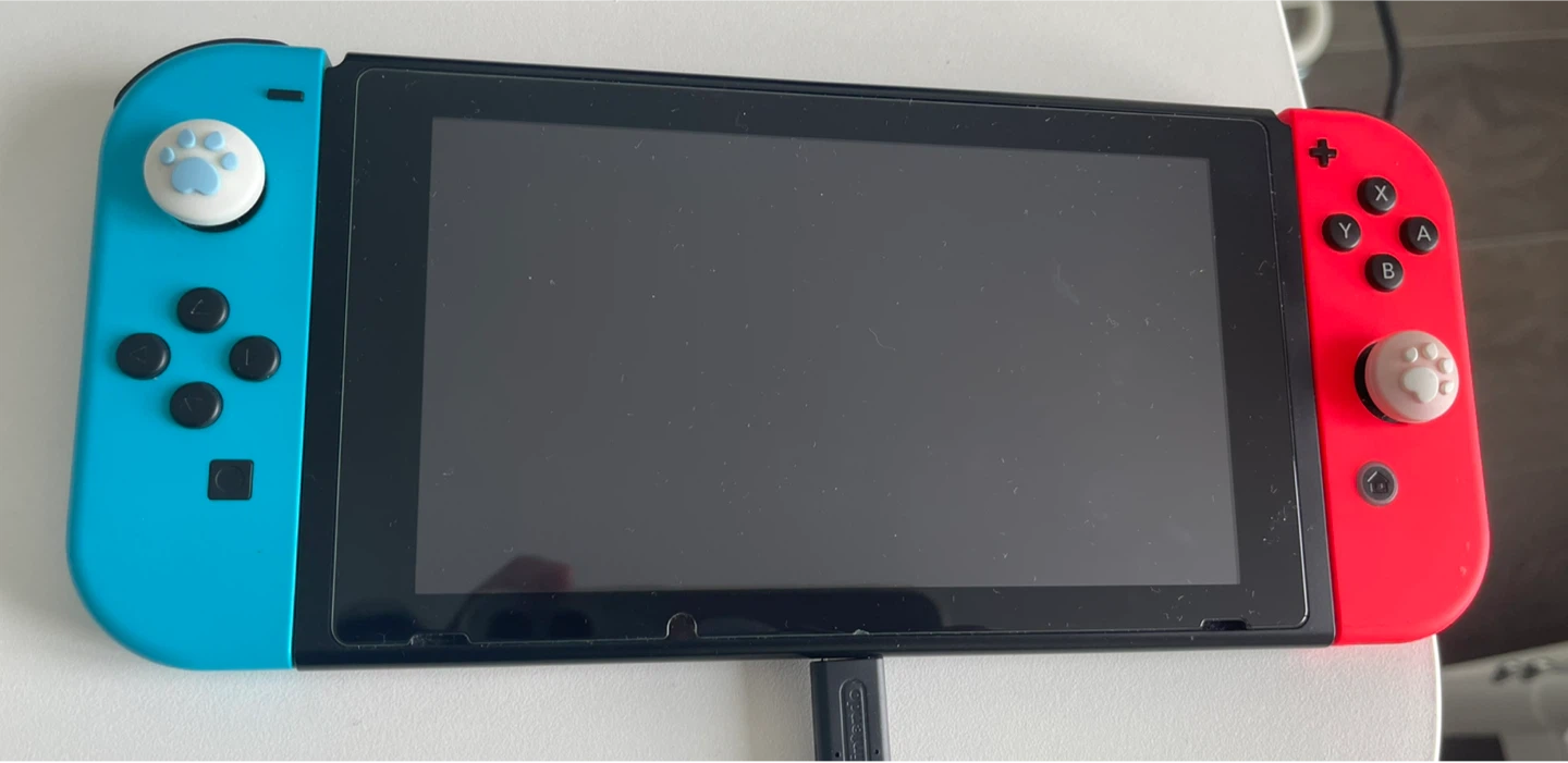 Nintendo Switch Console with travel case and game