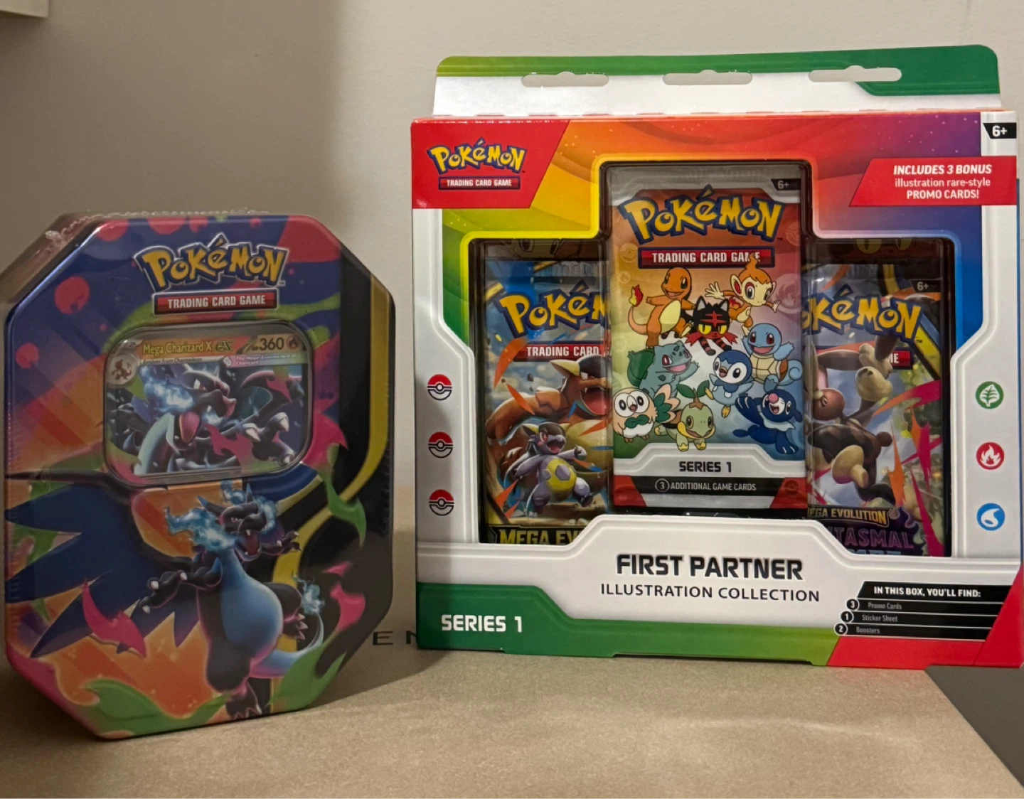 Pokemon First Partner Illustration Collection & Charizard tin
