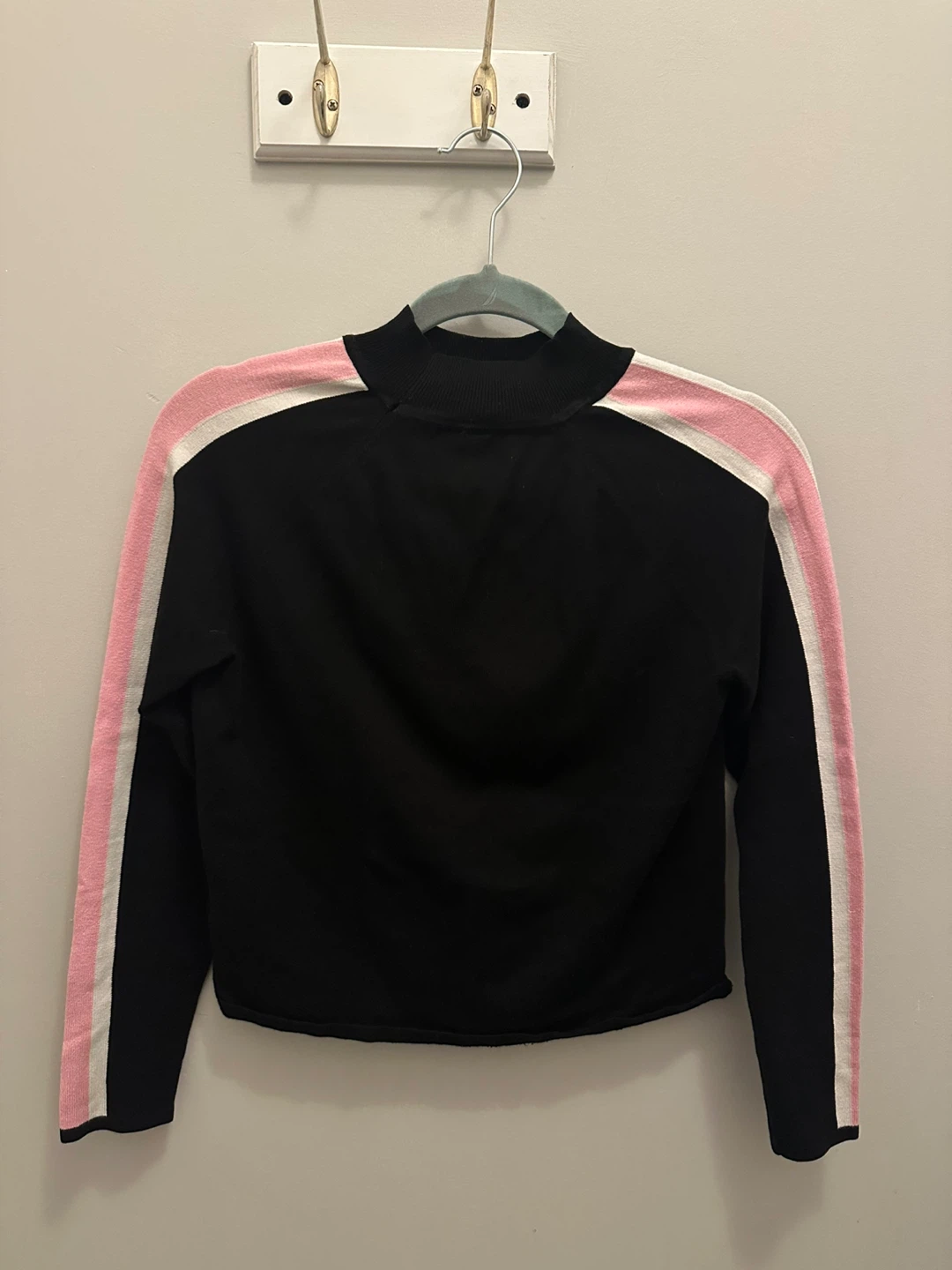 Black, pink, and white cropped turtleneck
