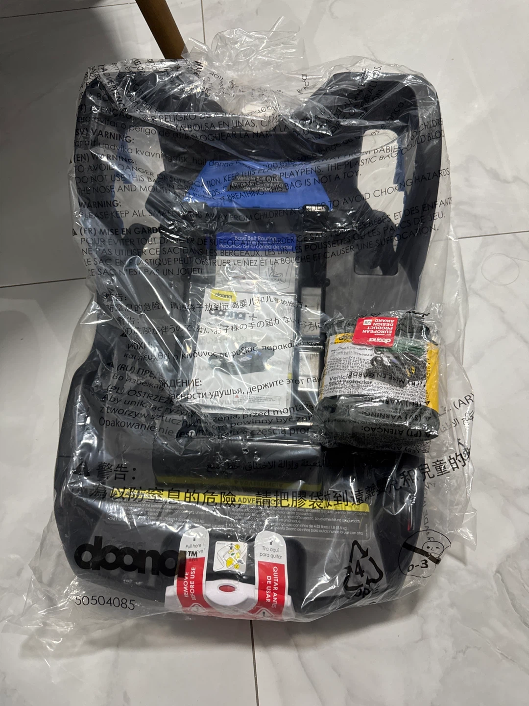 Doona Infant Car Seat Carrier and seat protector
