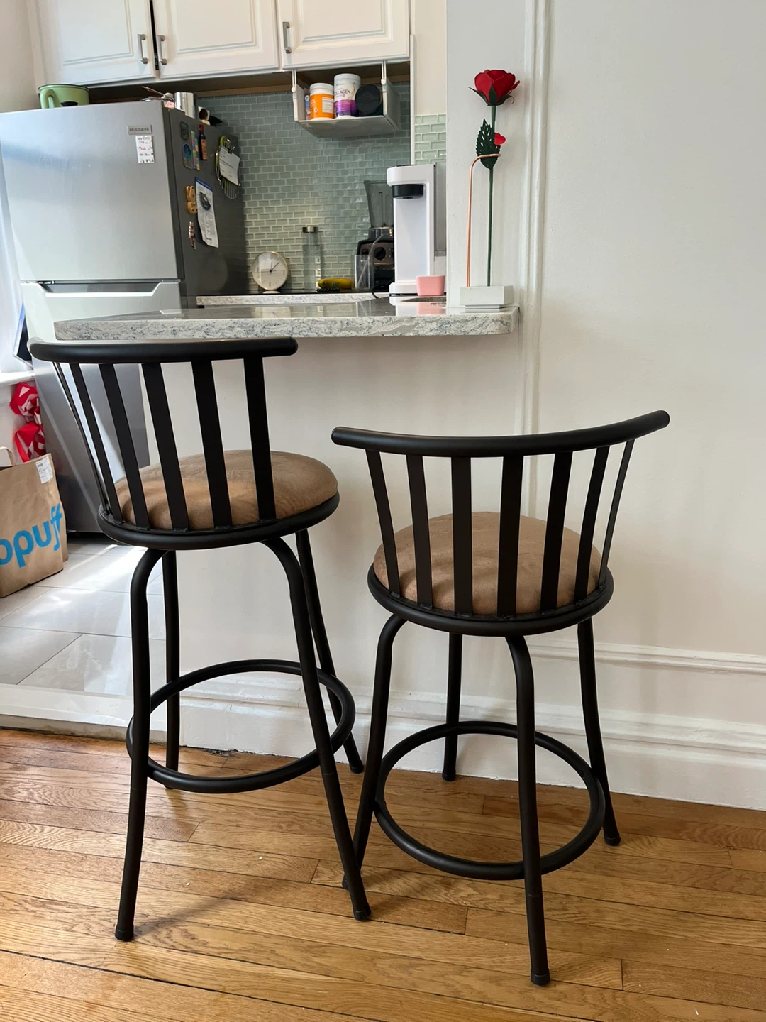 Set of 2 Black Metal Swivel Bar Stools with Tan Cushions
