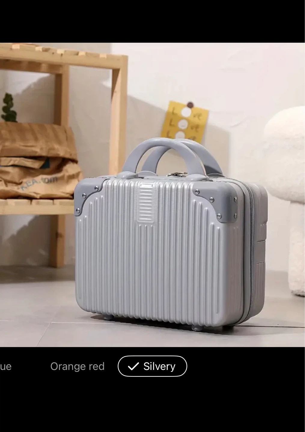 Silver 14 in small suitcase