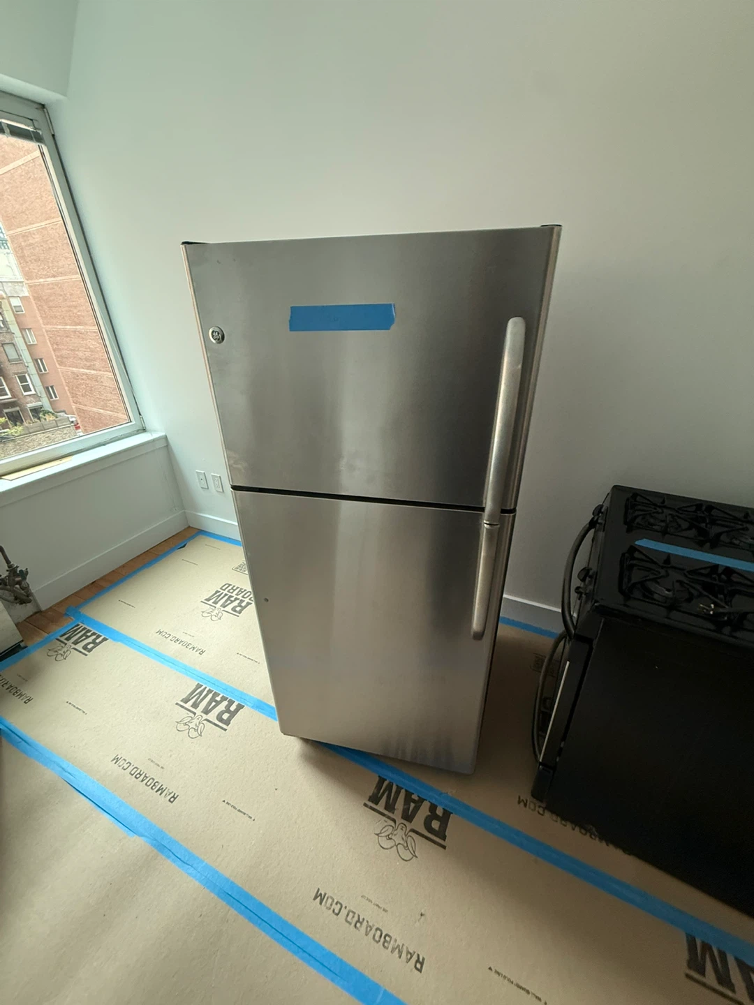 Stainless Steel Gas Range and Refrigerator Set