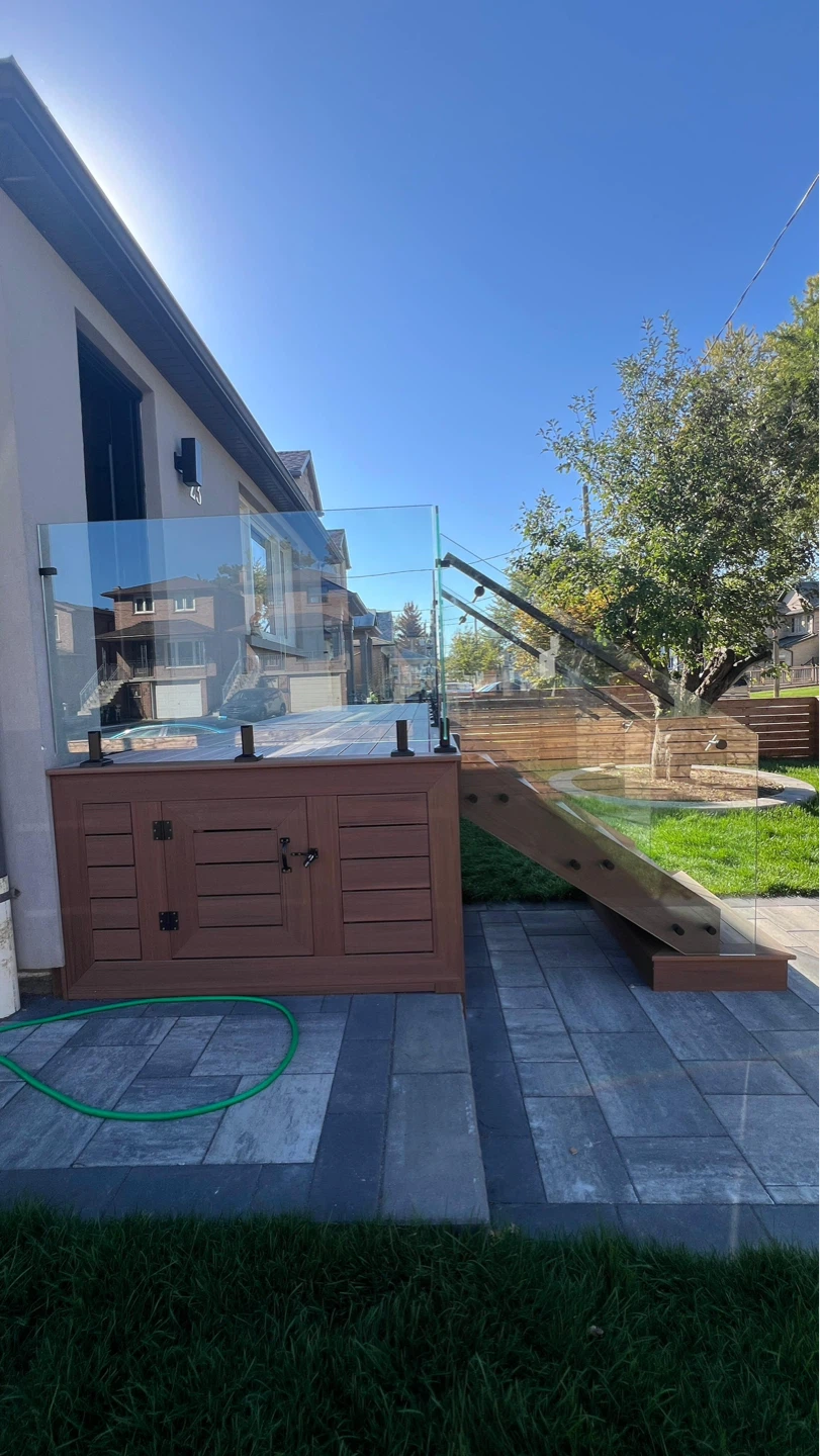 Outdoor Deck Railing System with Glass and Wood Storage