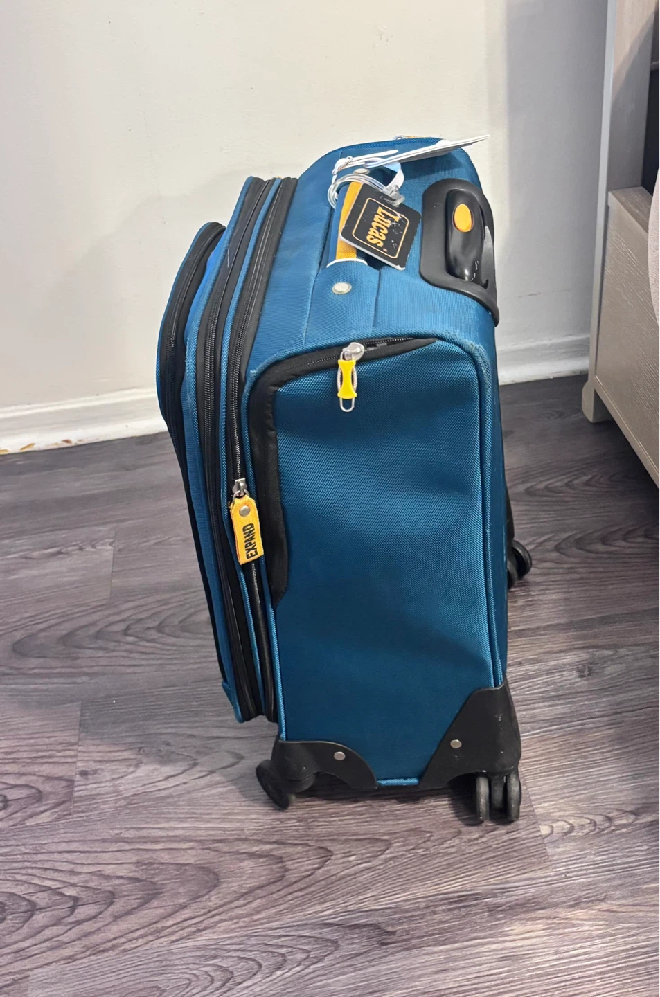 Lucas "Designed in USA" Teal Rolling Suitcase - photo 2