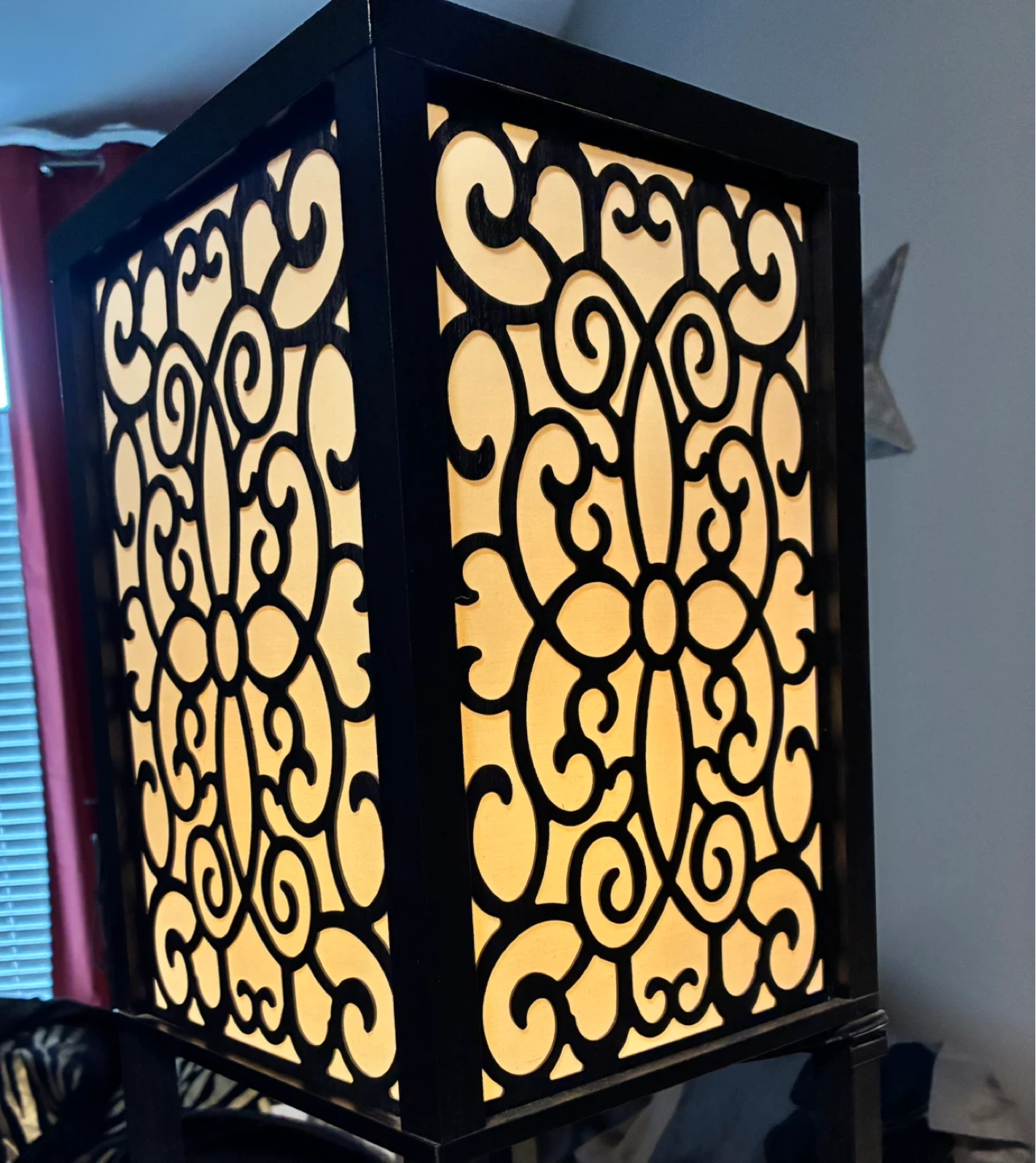 Black shelves floor lamp with decorative panel and shelves