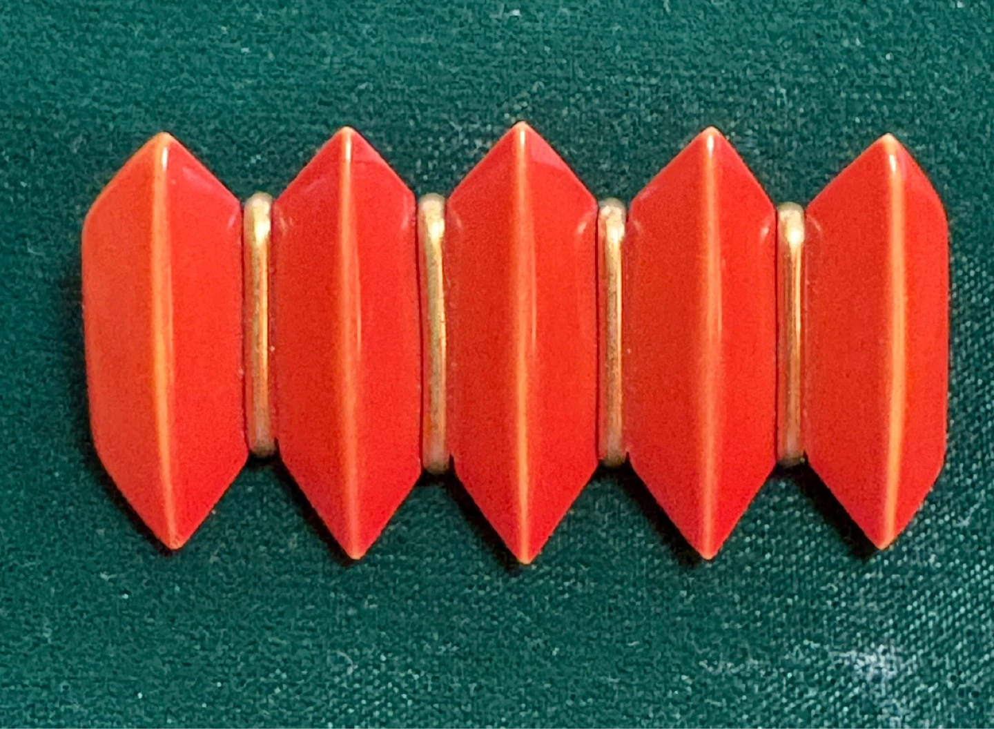 Red Accordion Style Brooch with Gold Accents