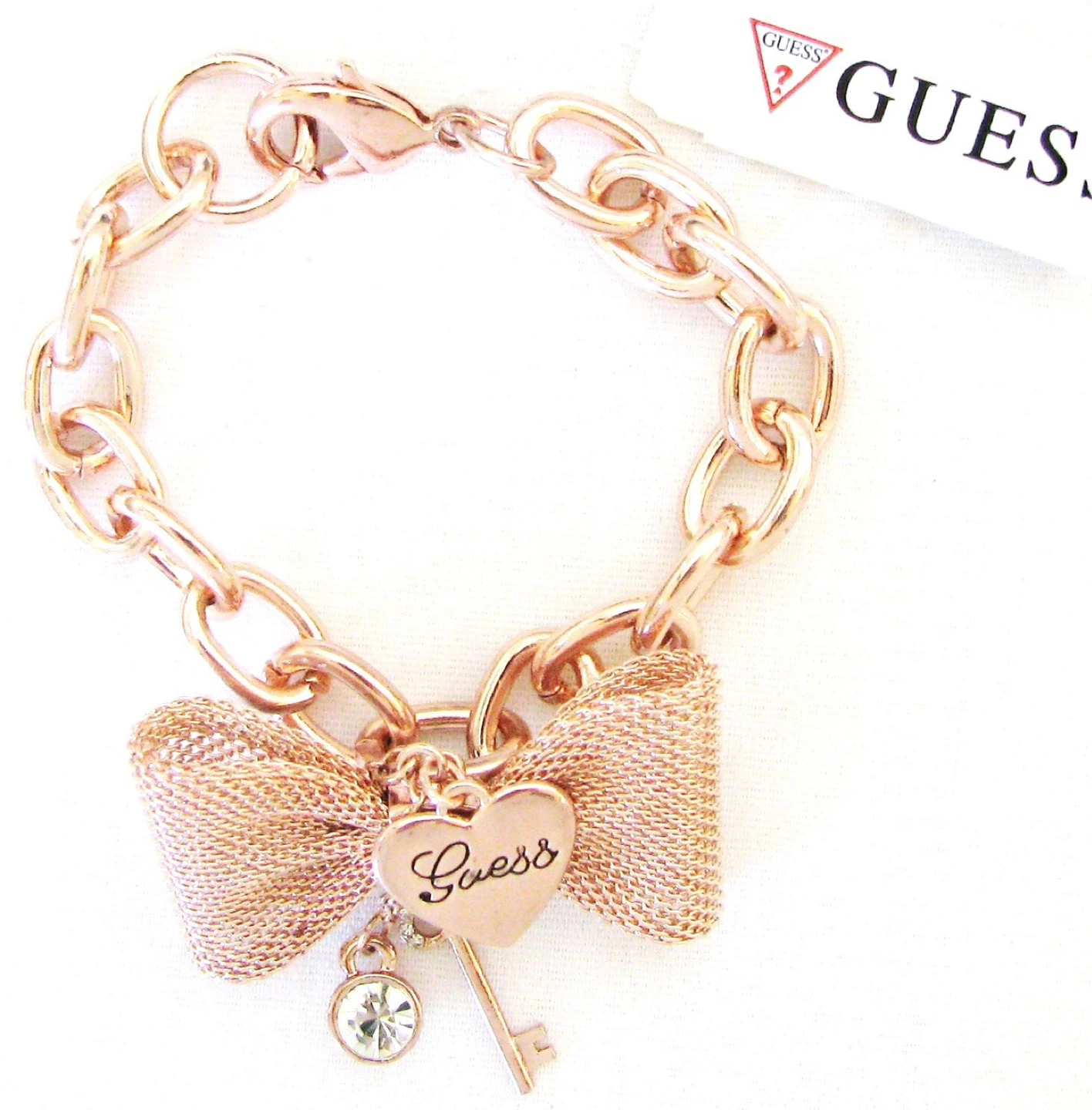 Guess Rose Gold Tone Bow Charm Bracelet - photo 2