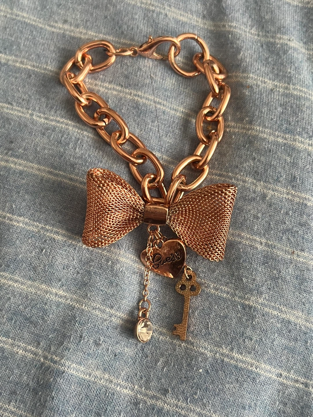 Guess Rose Gold Tone Bow Charm Bracelet