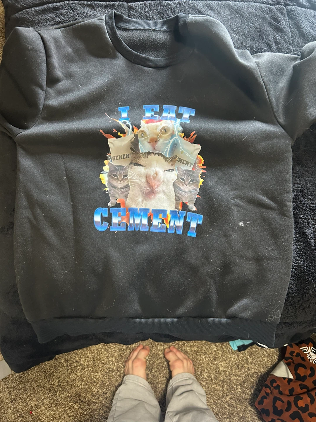 My brothers really small dumb sweater