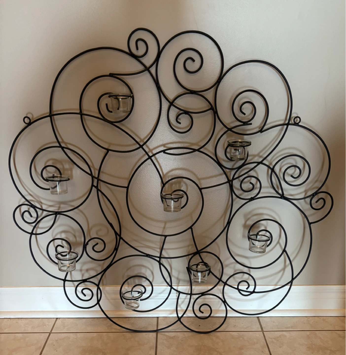 Black Metal Swirl Wall Sconce with 8 Glass Tealight Holders