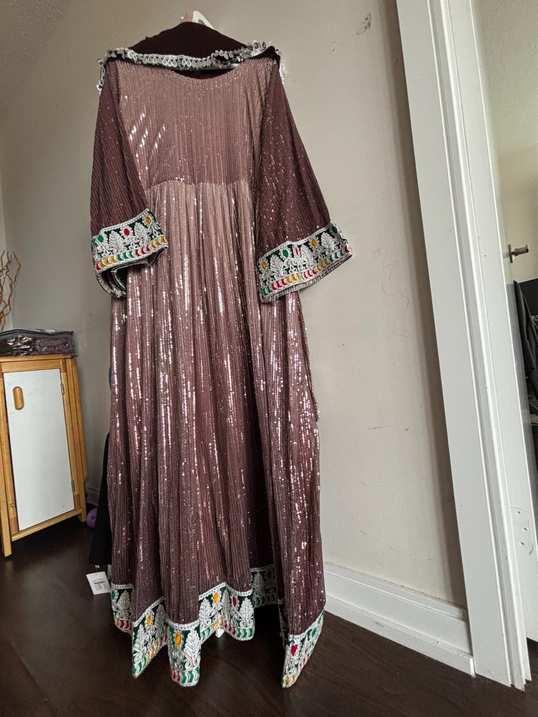 Sparkly sequined dress with embroidered trim