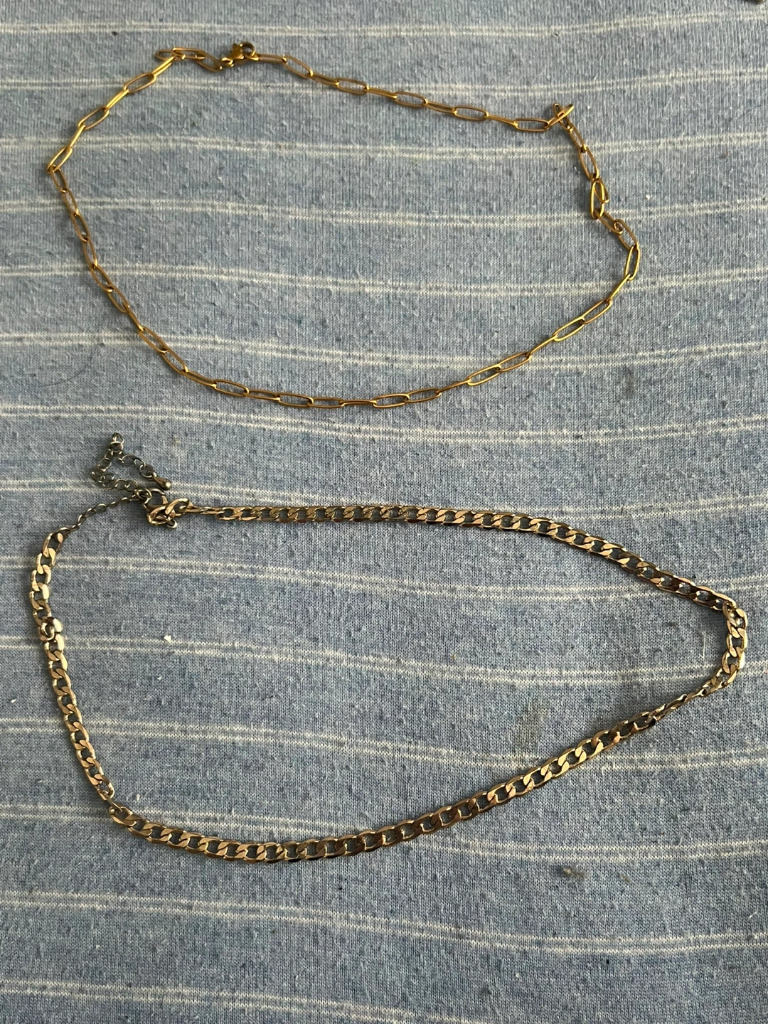 Gold coloured chain necklaces