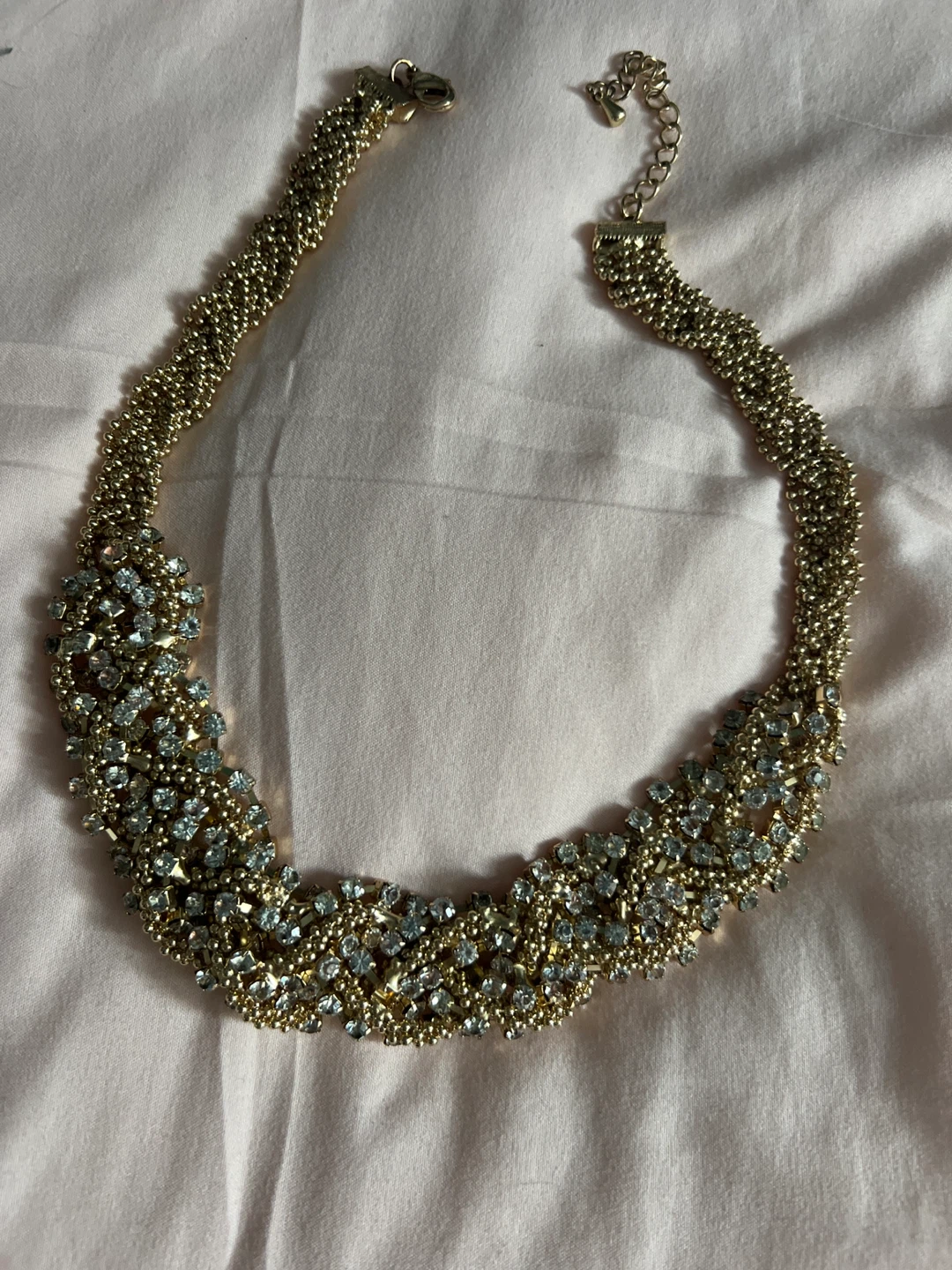 Gold-tone statement necklace with rhinestones