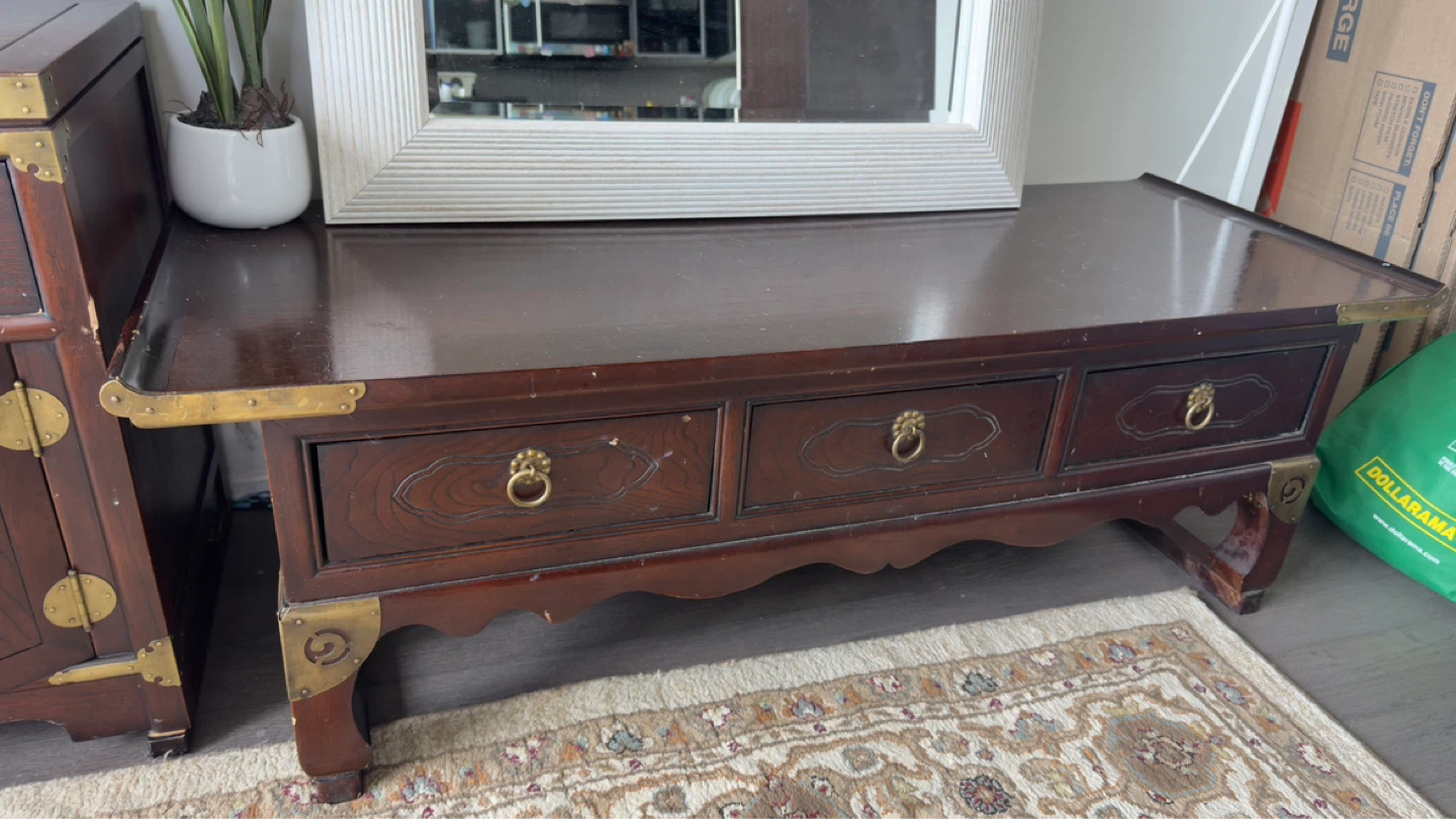 Antique Dark Wood Coffee Table with Brass Accents