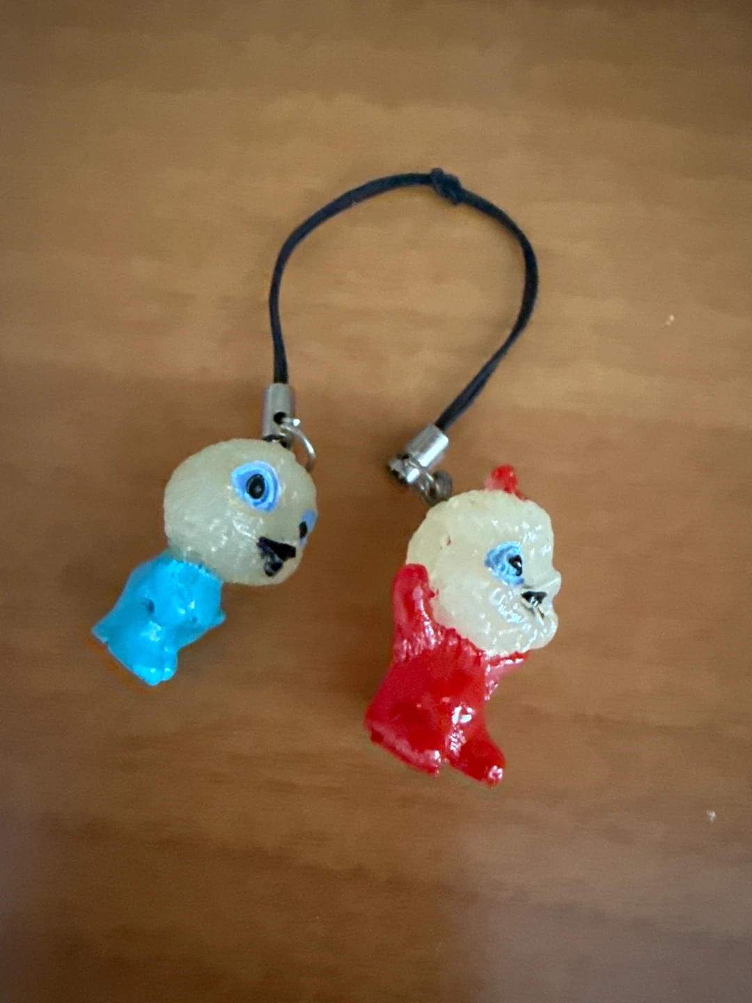 Two handmade charm pendants