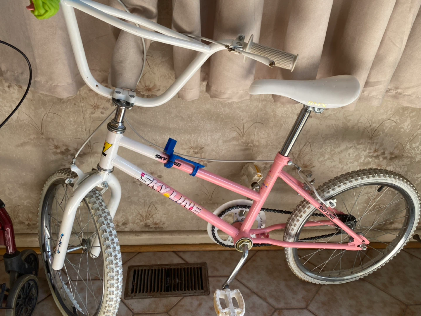 Pink and White Skyline BMX Bike