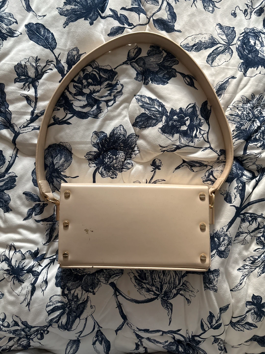 Cream patent leather clutch purse with strap