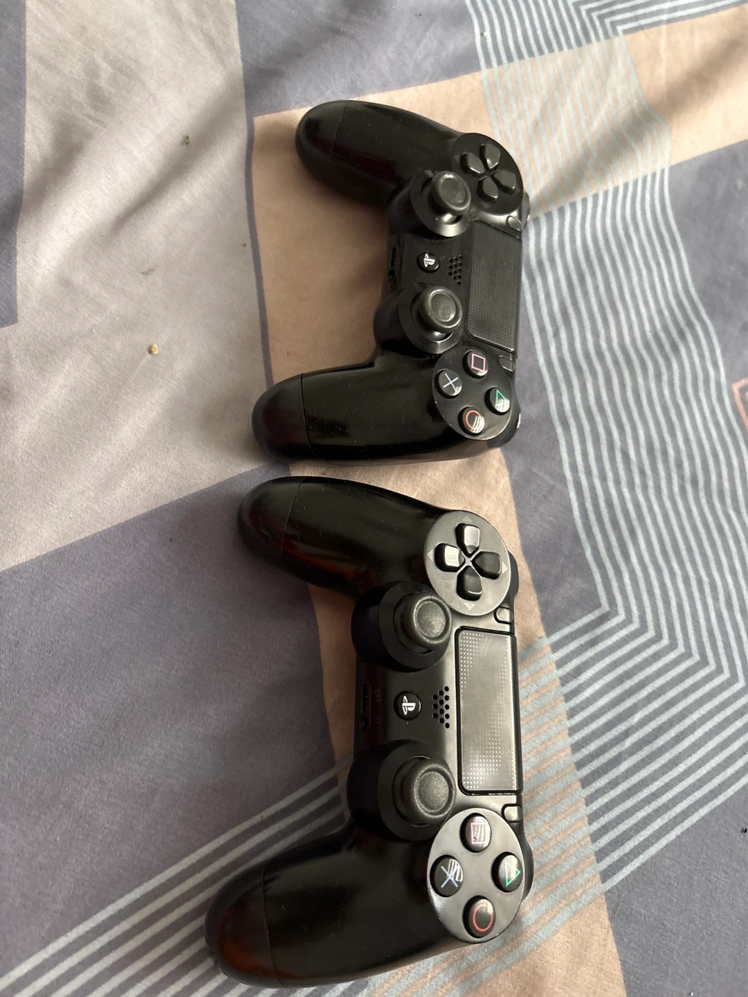 2x Black Sony PlayStation DualShock 4 Controllers