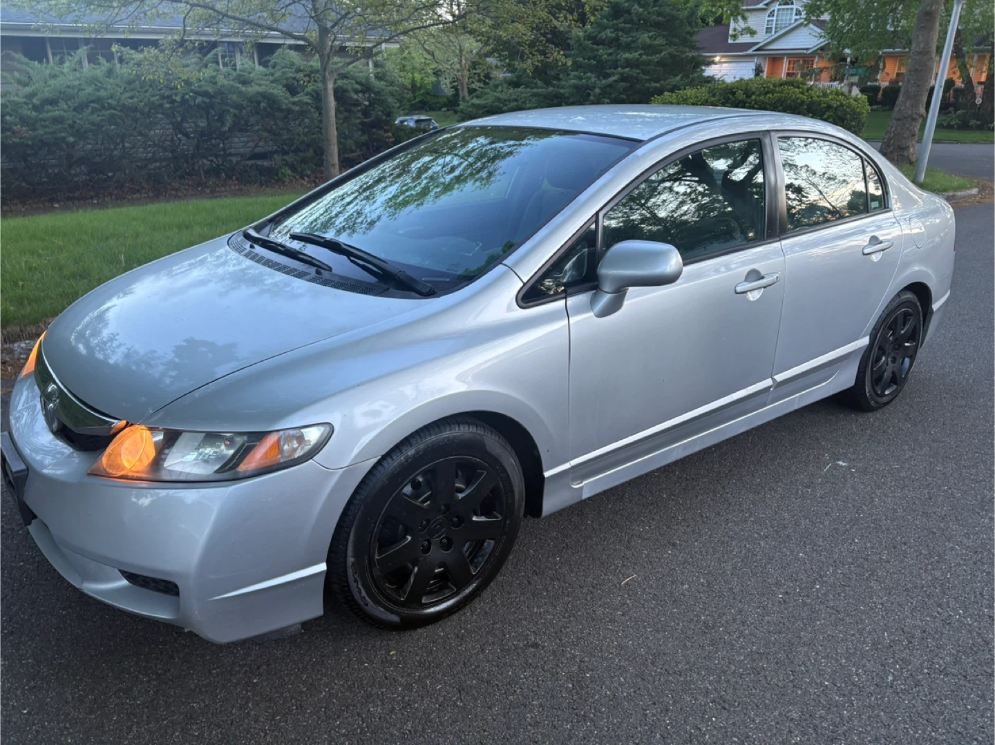 Silver Honda Civic Sedan with Black Wheels