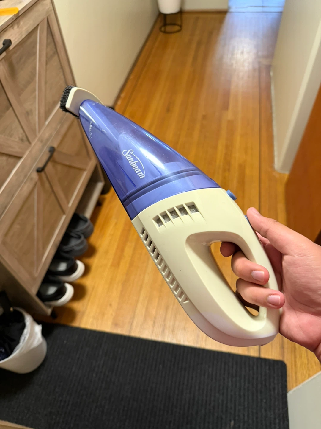 Handheld portable vacuum