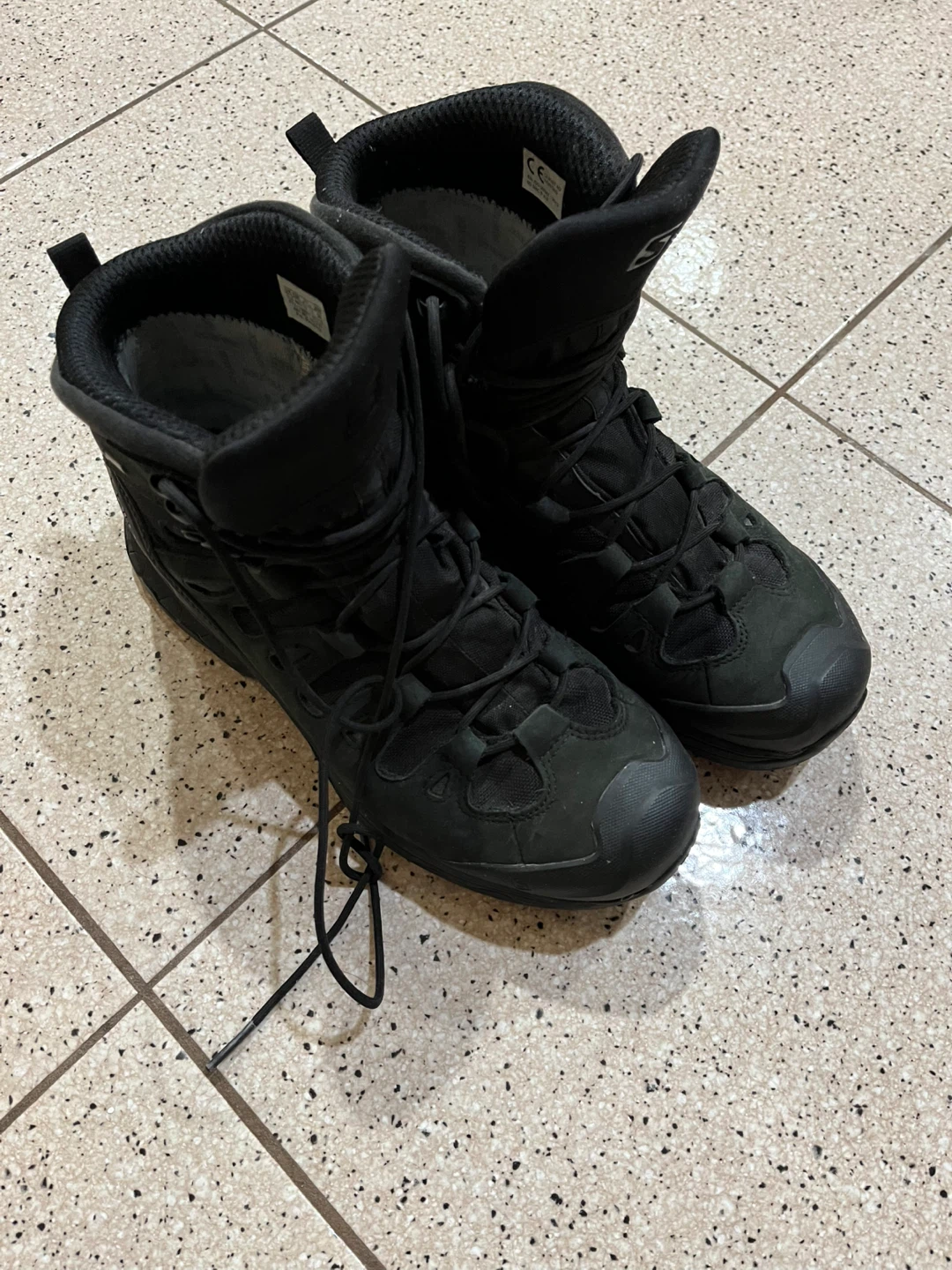 Black hiking boots by Salomon size 12