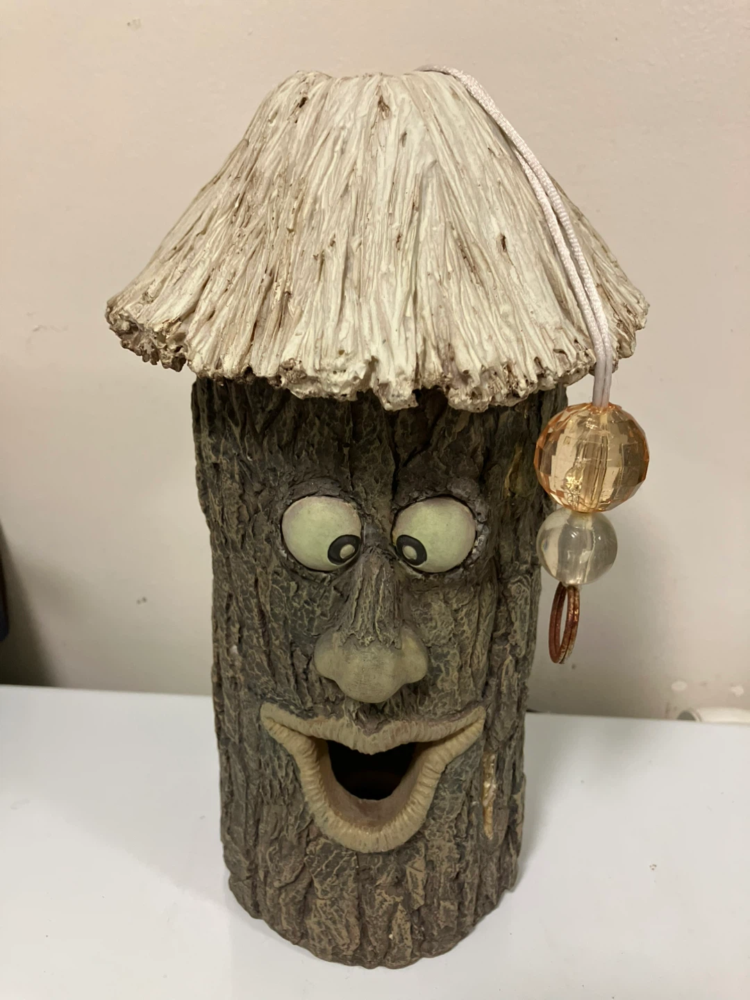 Whimsical Tree Trunk Face Decoration