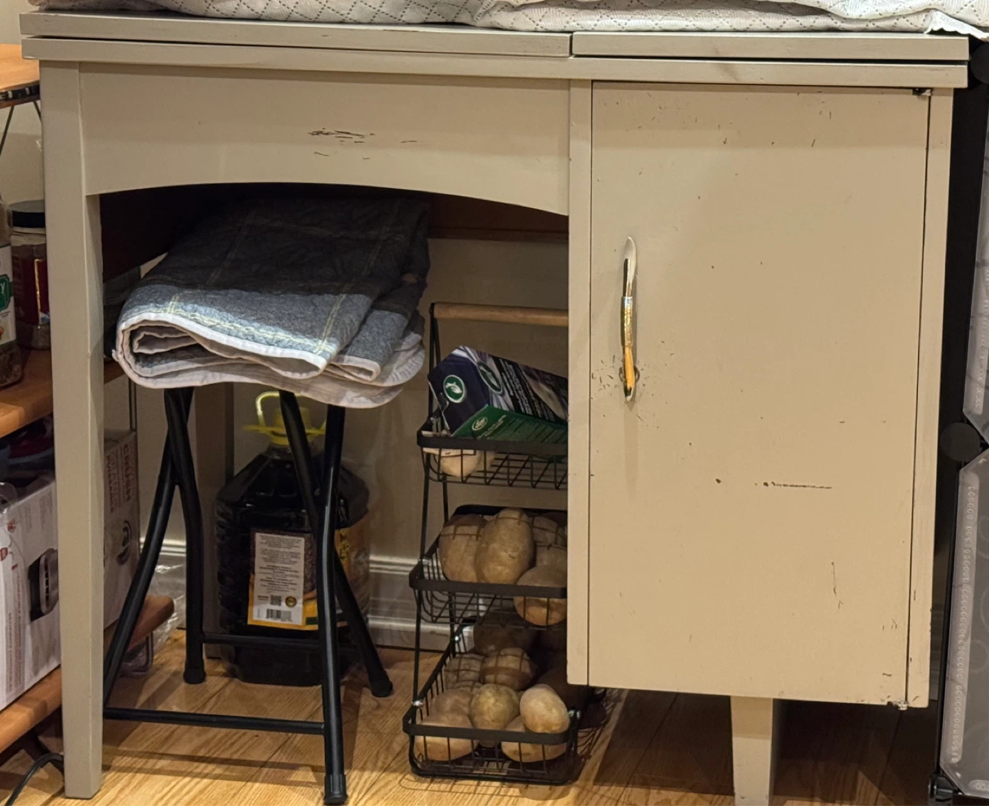Study table/Cream coloured utility cabinet with door