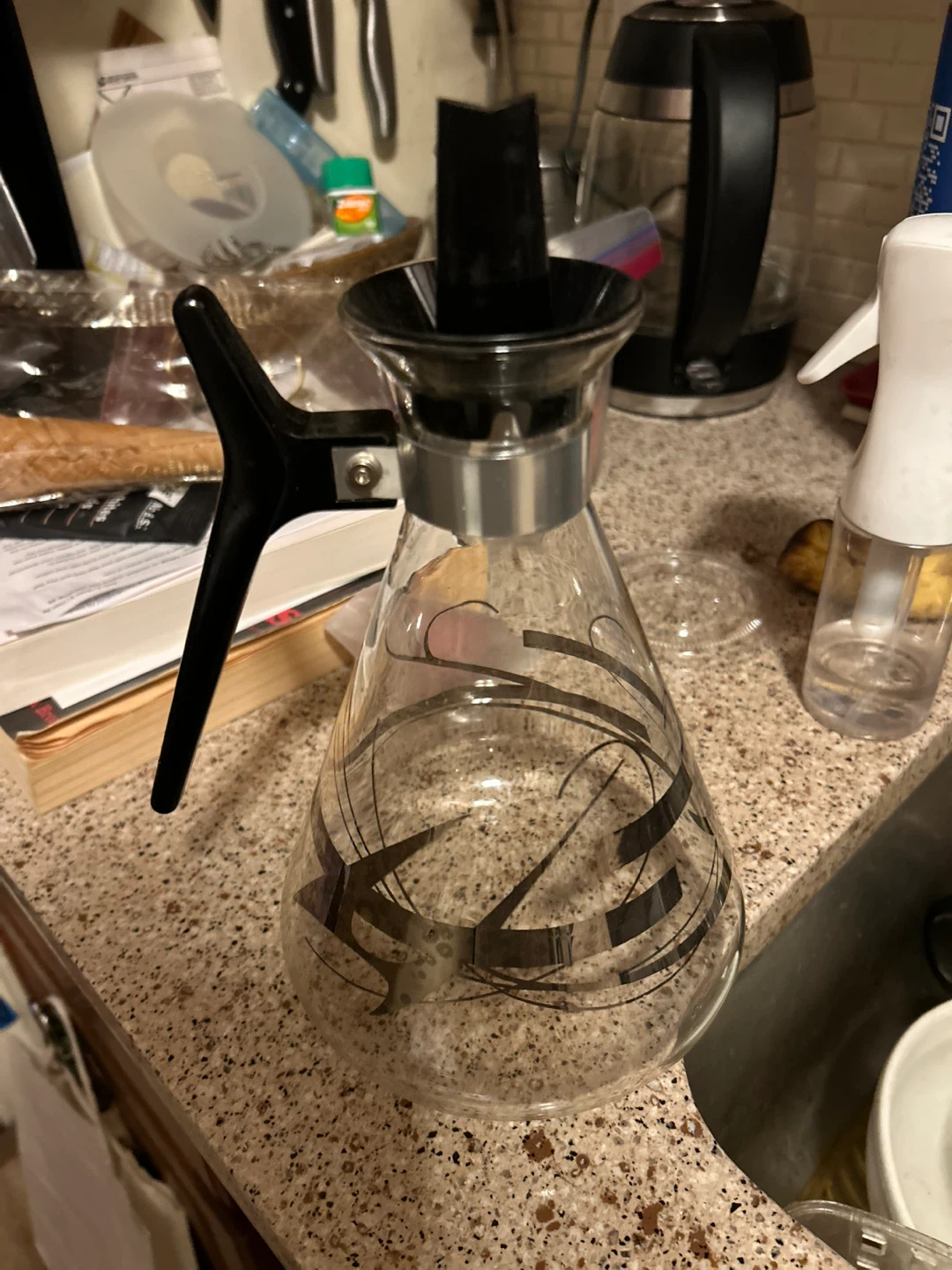 Glass Carafe with Black Handle and Decorative Pattern
