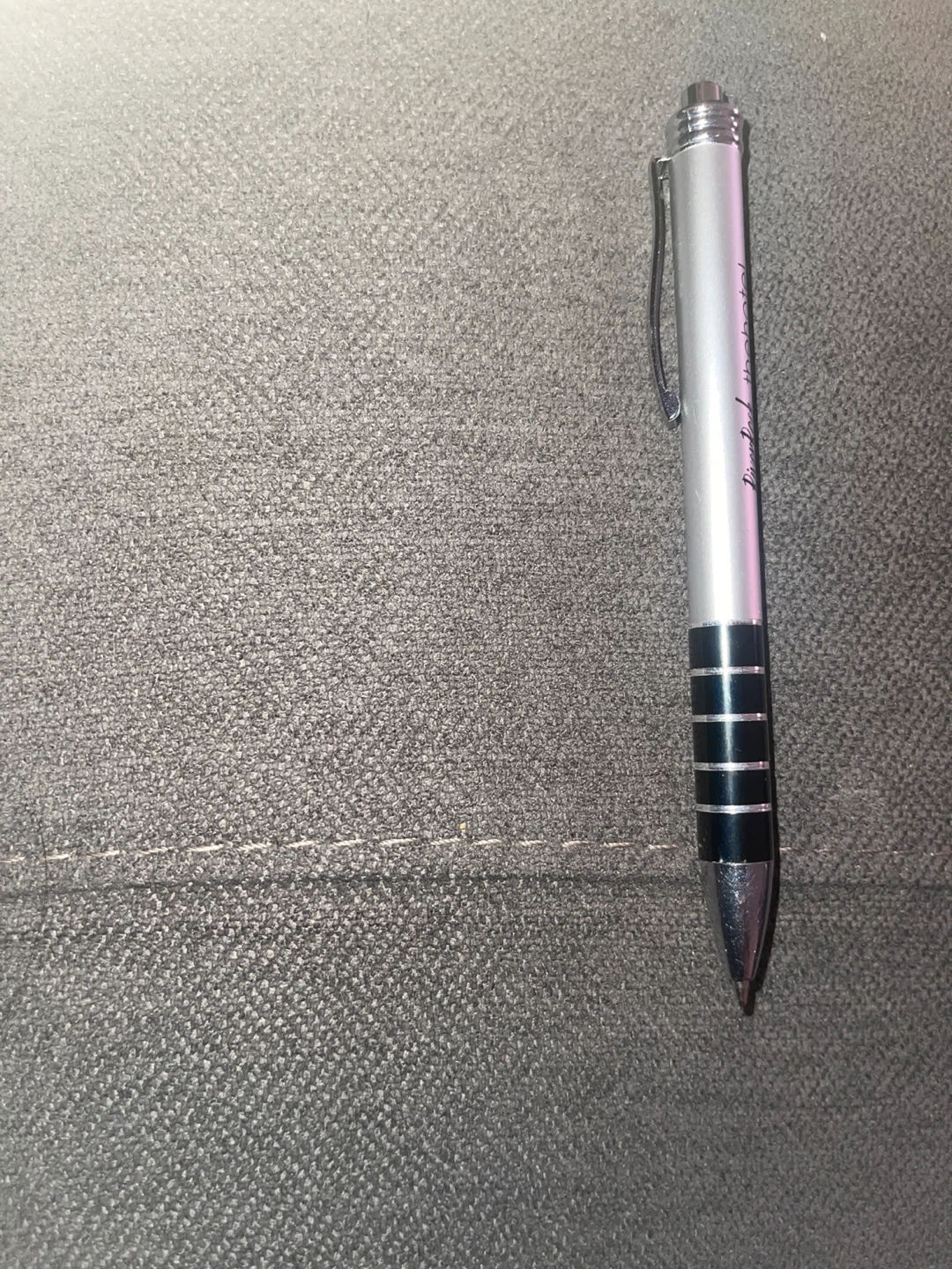 Silver and Black Ballpoint Pen