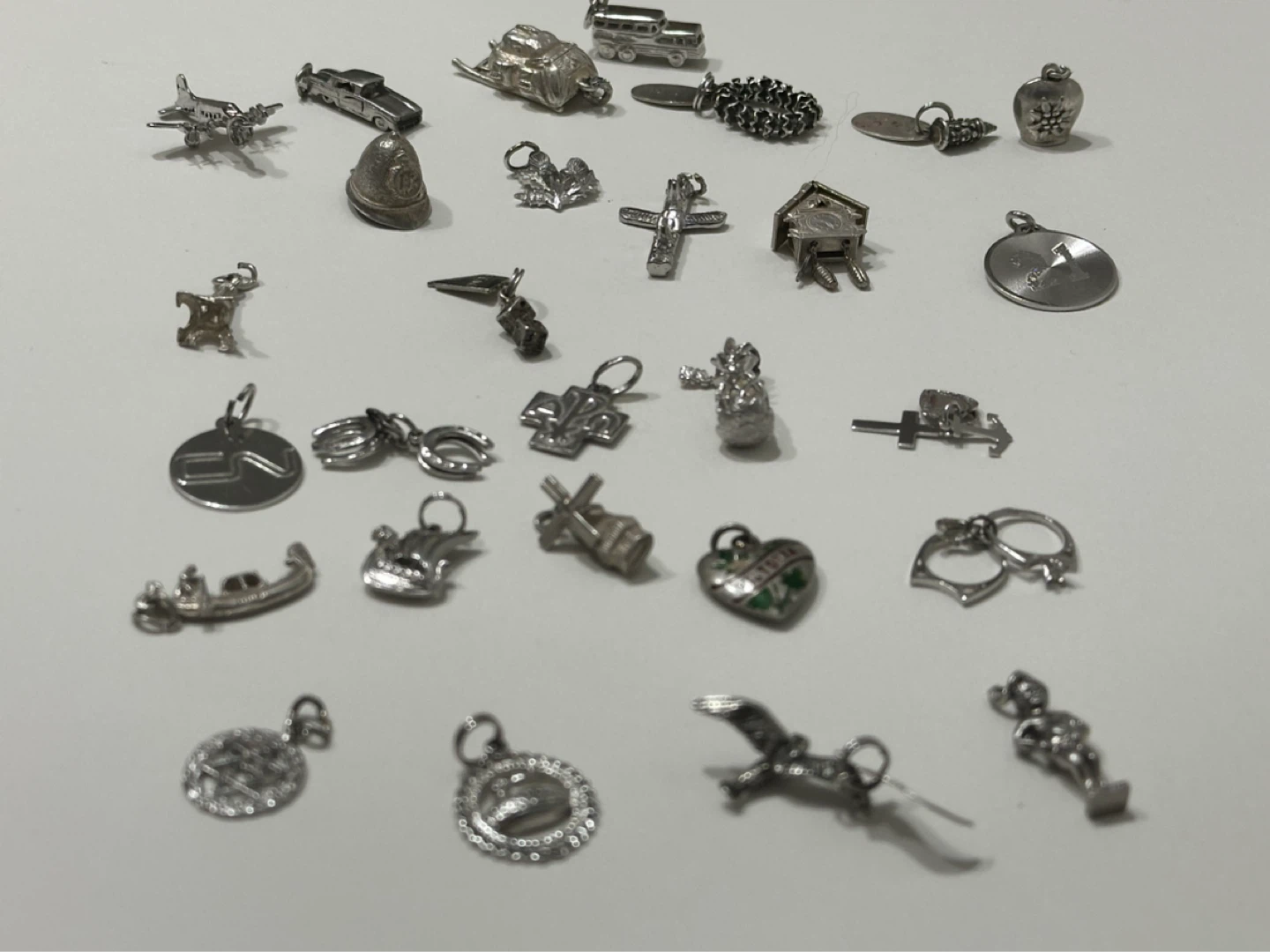 Vintage Sterling charms individually priced some rare ones
