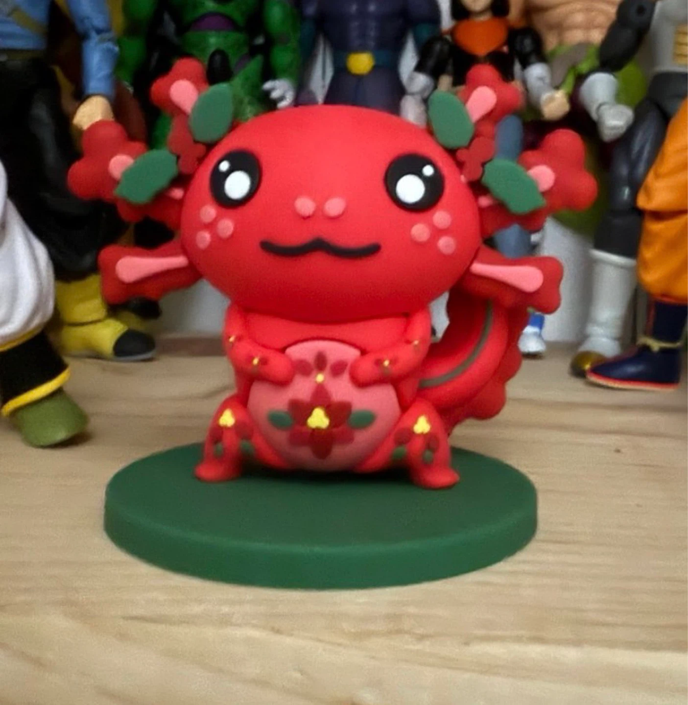 Red Axolotl Figure with Floral Design