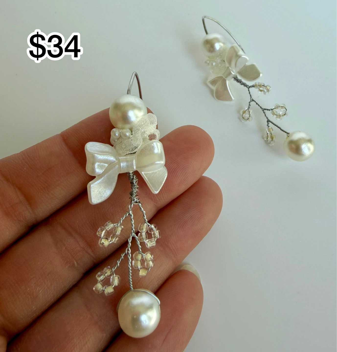 White Bow Pearl Dangle Earrings