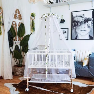 White Baby Bassinet with Wooden Frame and Storage Shelf