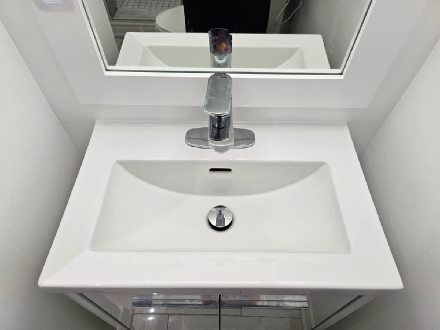White Vanity Sink with Chrome Faucet and Storage Cabinet - photo 4
