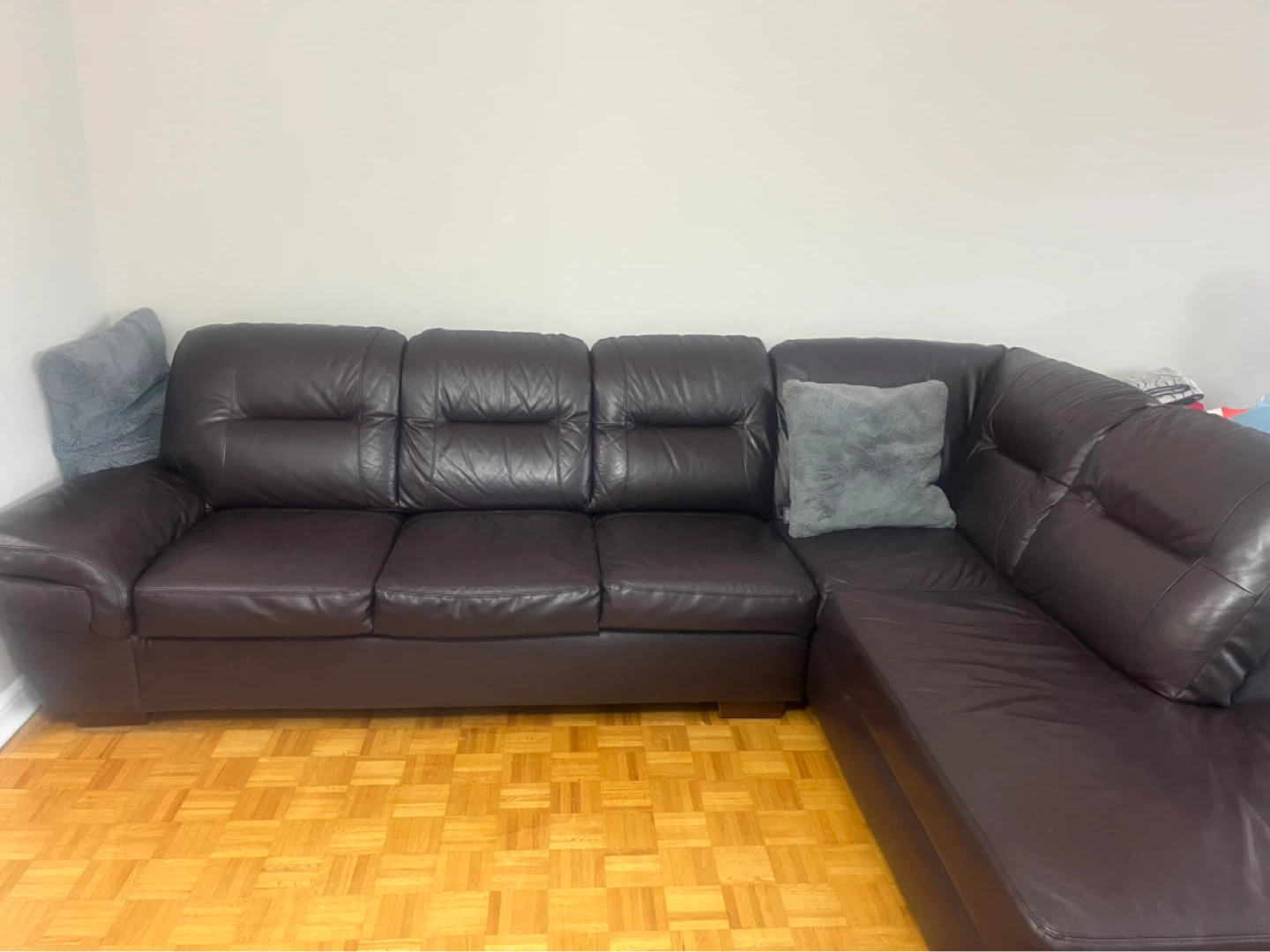 Brown leather sectional sofa