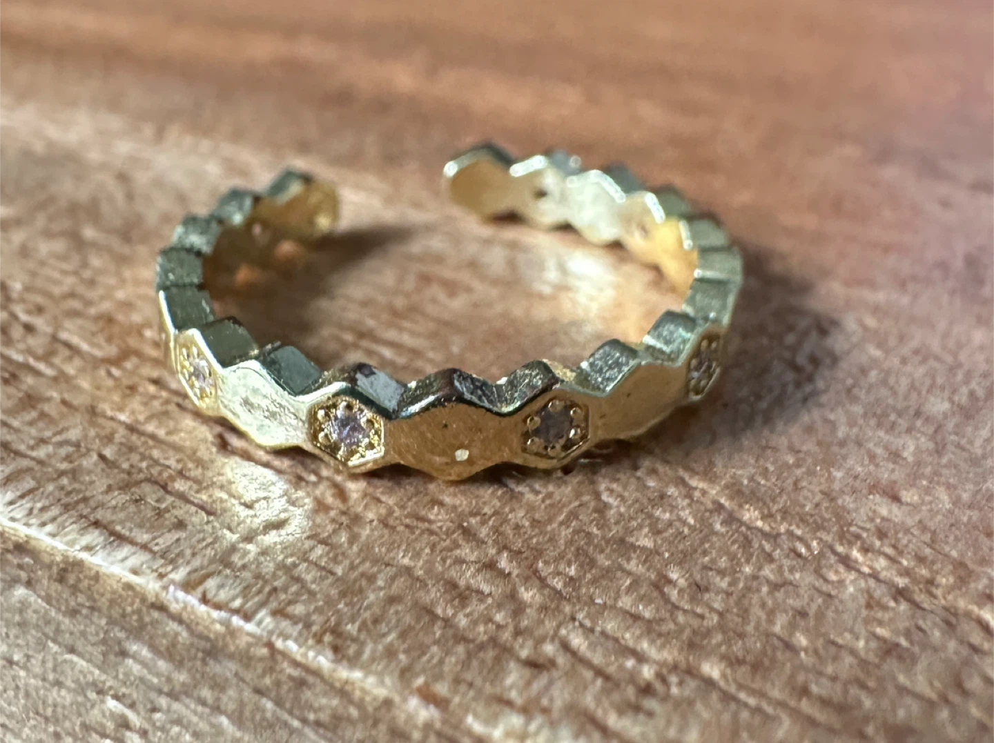 Gold tone Hexagon ring with small stones