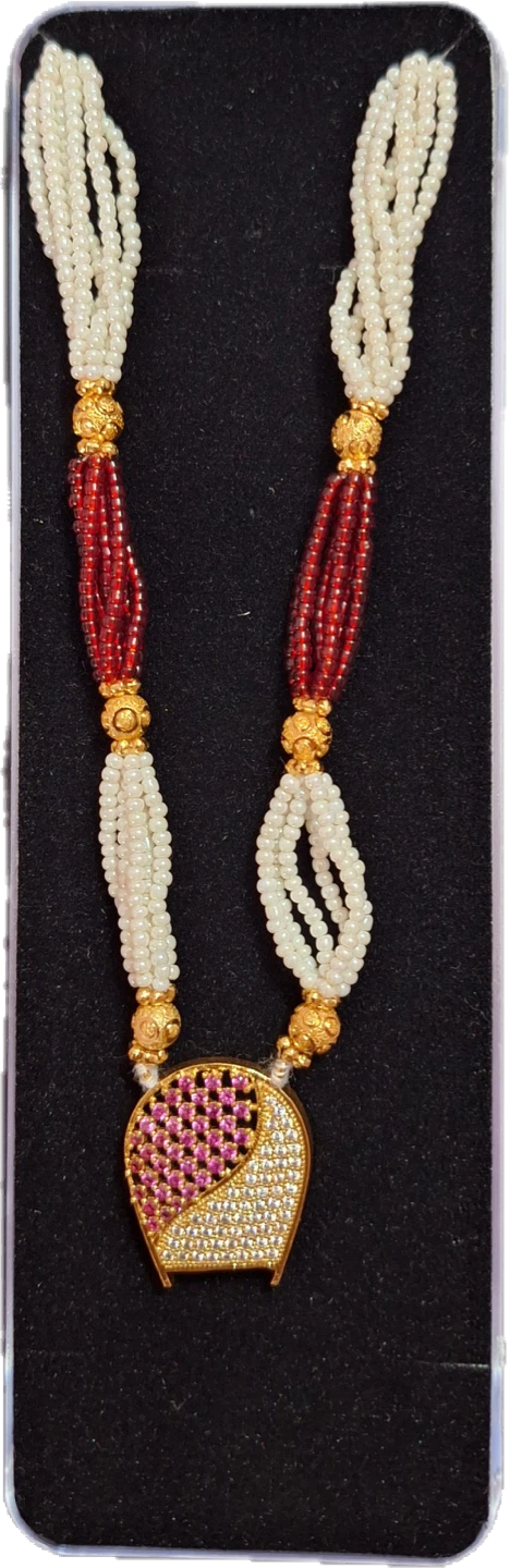Gold Tone Necklace with White Beads and Red Accents