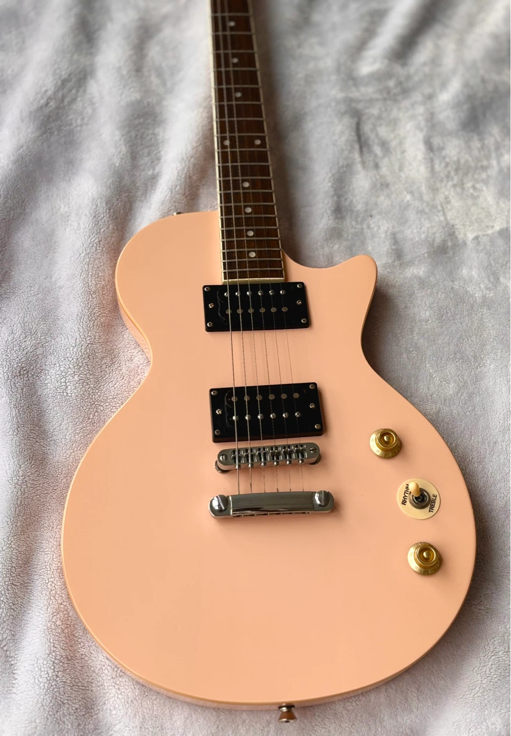 Like new Donner Les Paul guitar in shell pink.