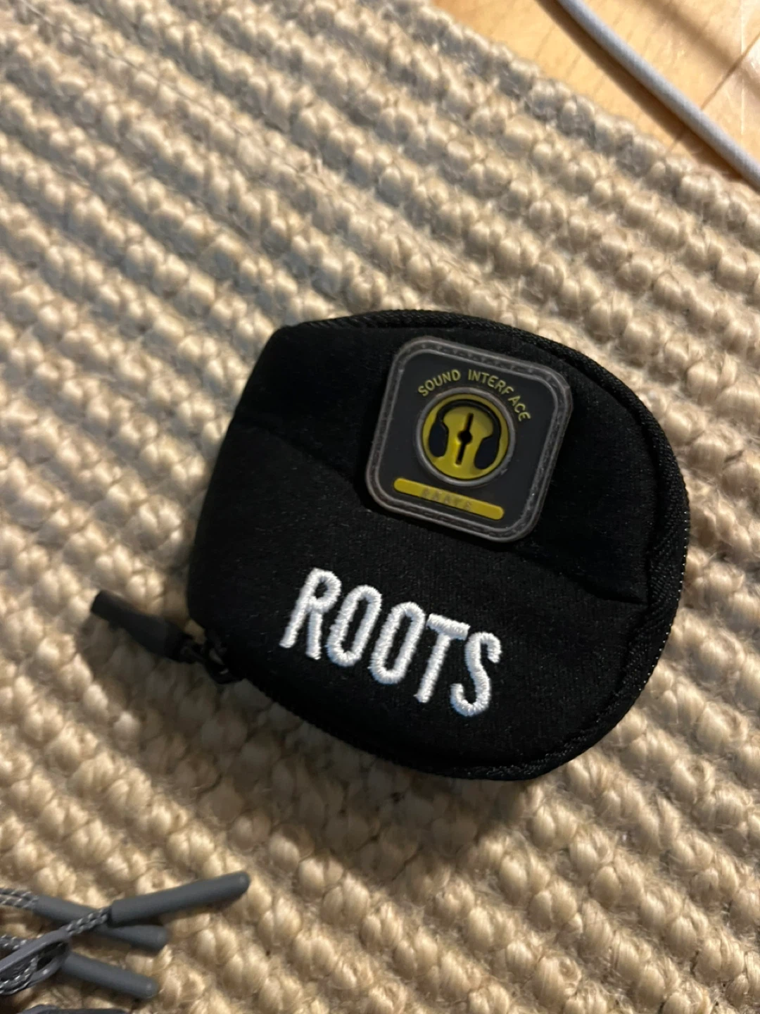 Roots Black "Sound Interface" Earbud Case