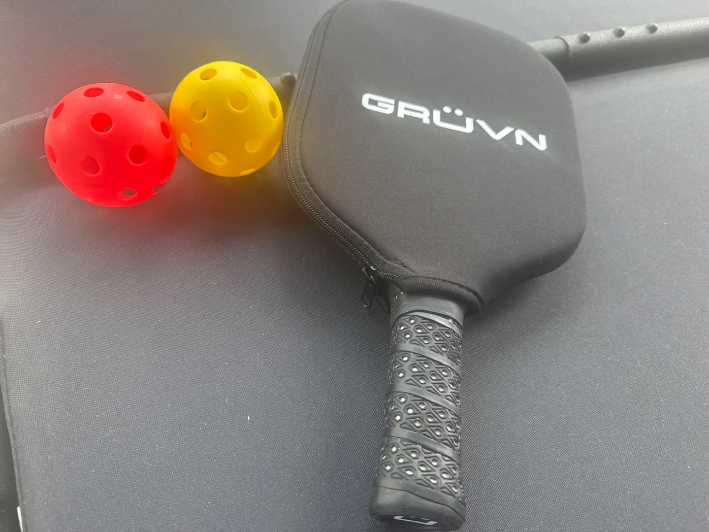 Free GRÜVN pickleball paddle & 2 balls