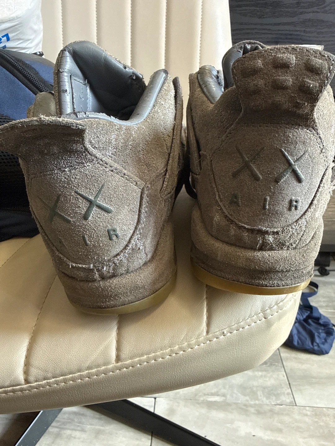 Kaws x Air Jordan 4 Retro Sneakers