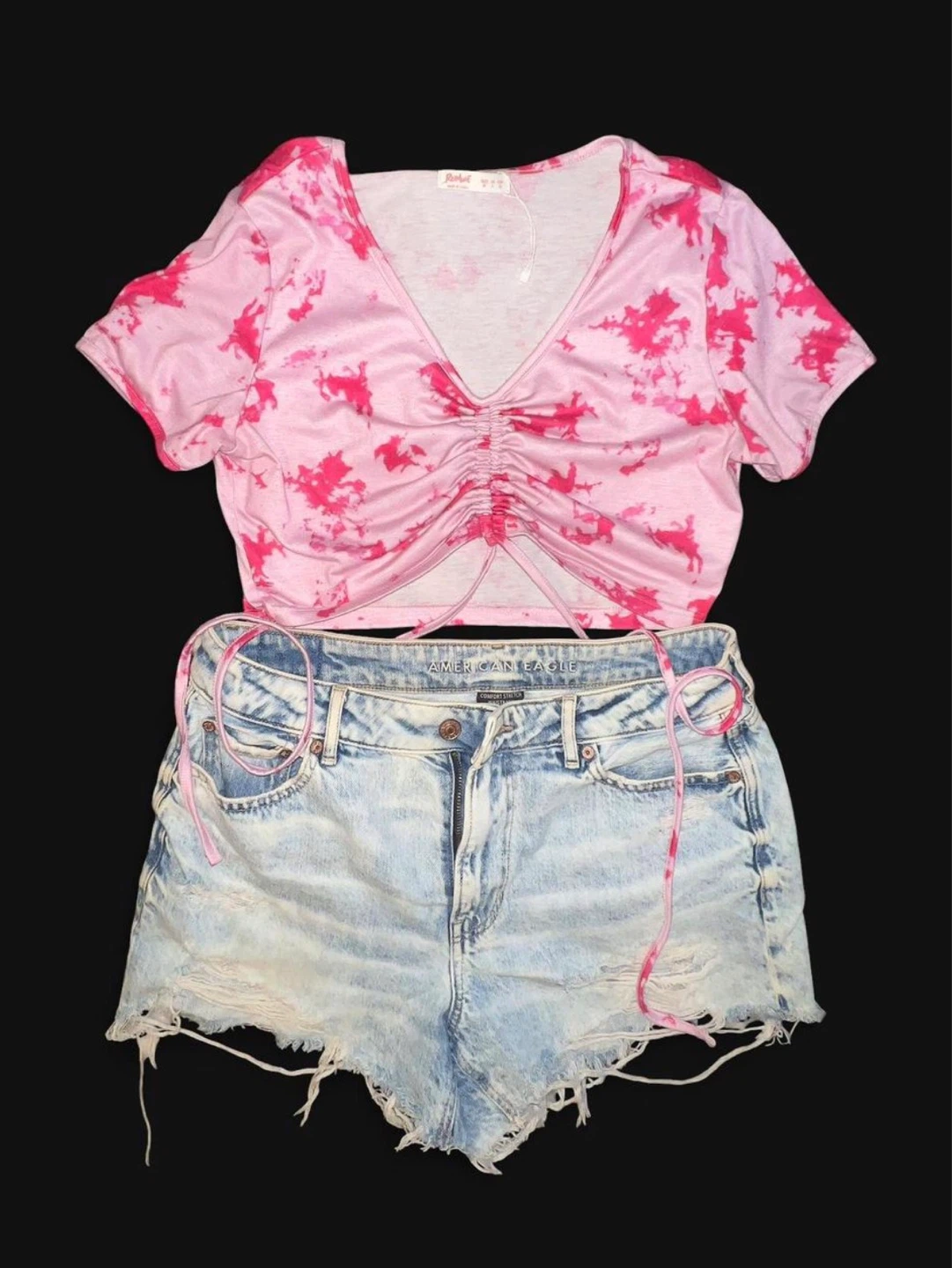 Pink tie-dye crop top and American Eagle denim shorts set