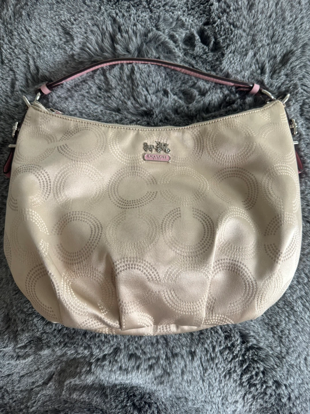 COACH purse, with pink accents and pink leather handle with pink