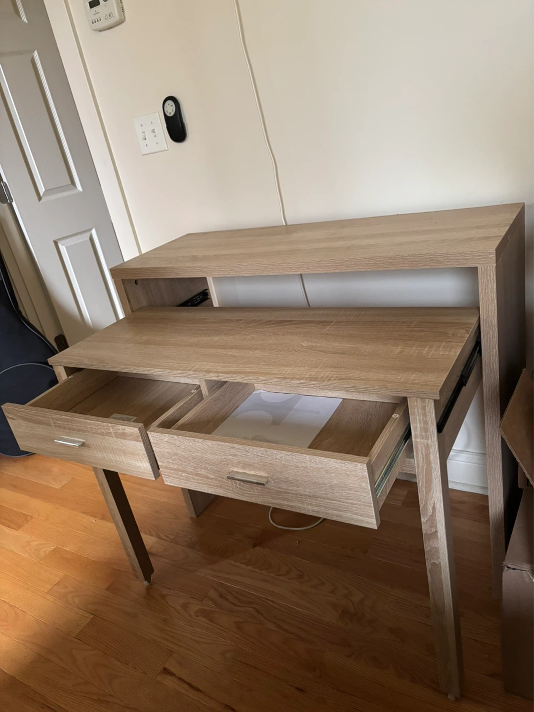 Adjustable pull-out desk