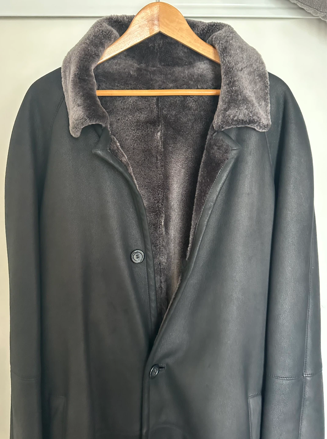Leather coat with natural fur