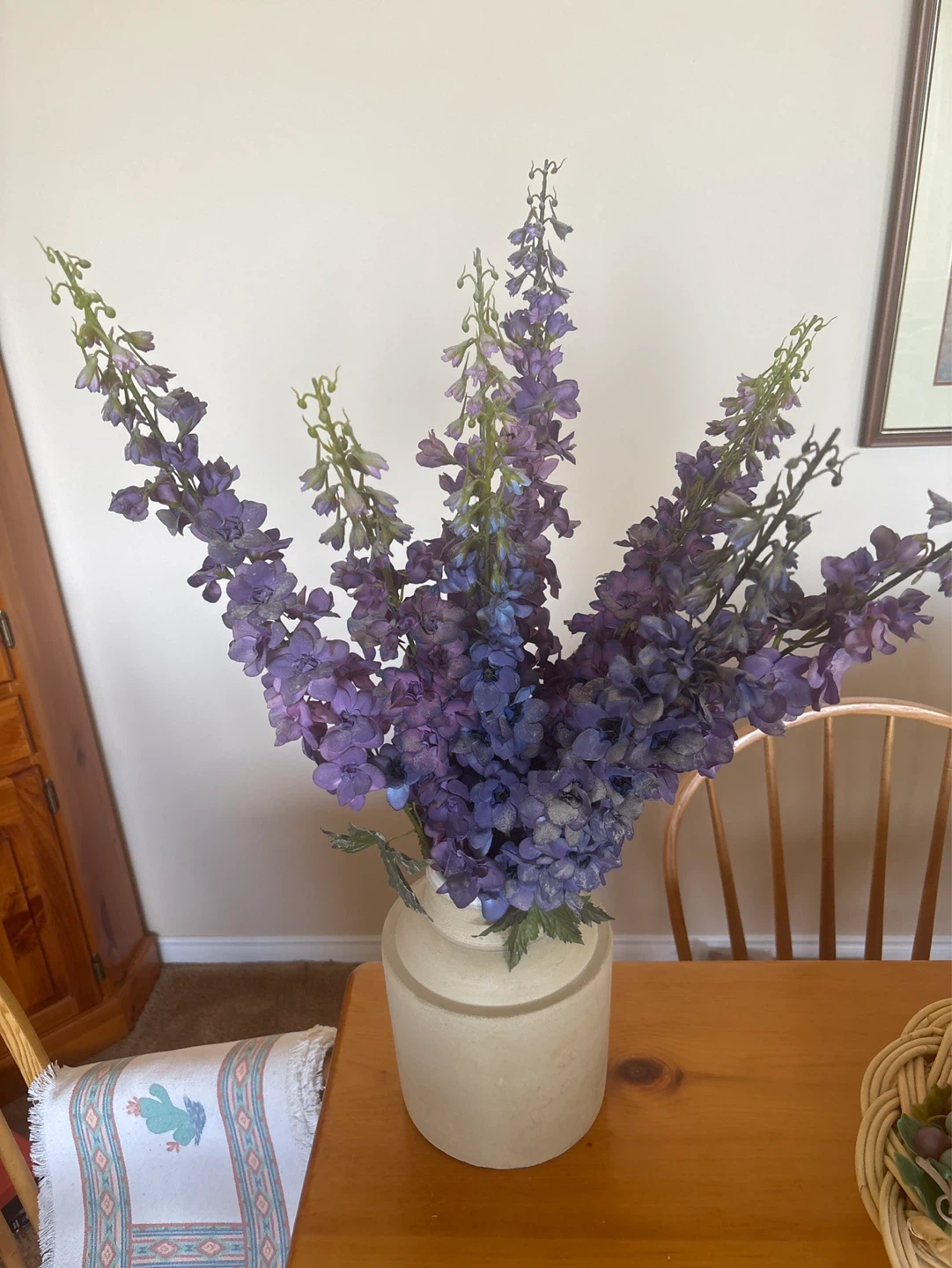 Purple Artificial Delphinium Flowers in Beige Vase