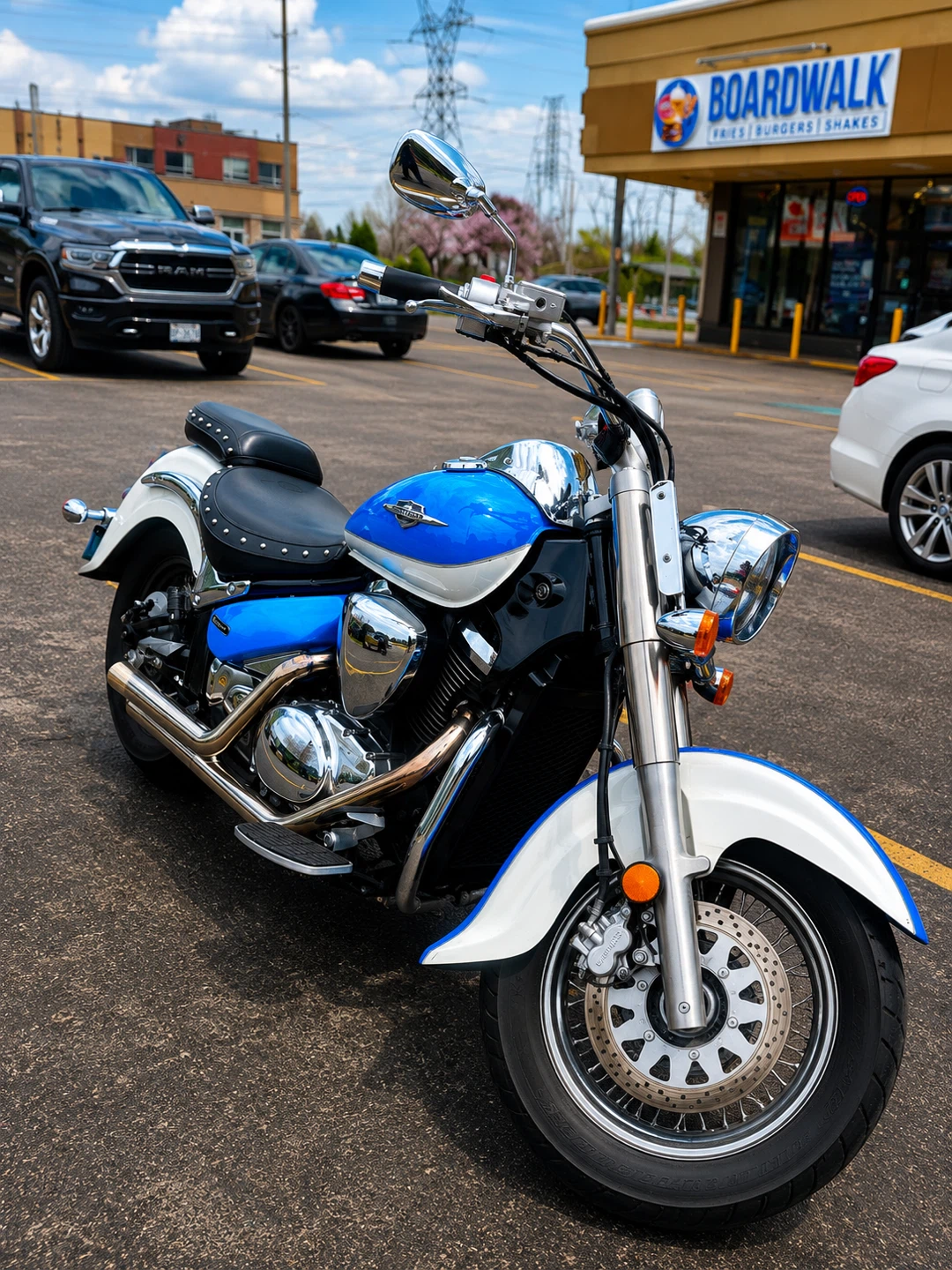 Blue and White Suzuki Motorcycle for rent