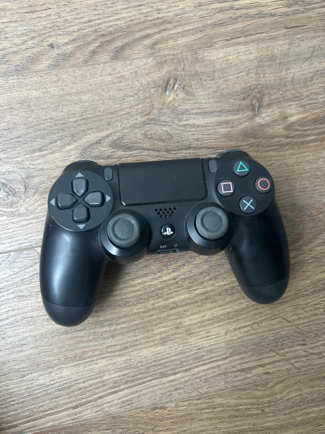 Black Sony PlayStation 4 DualShock 4 Controller